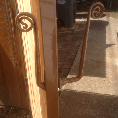 custom, hand-forged, solid steel gate handle made by Dan Johnson of Laughingdog Forge